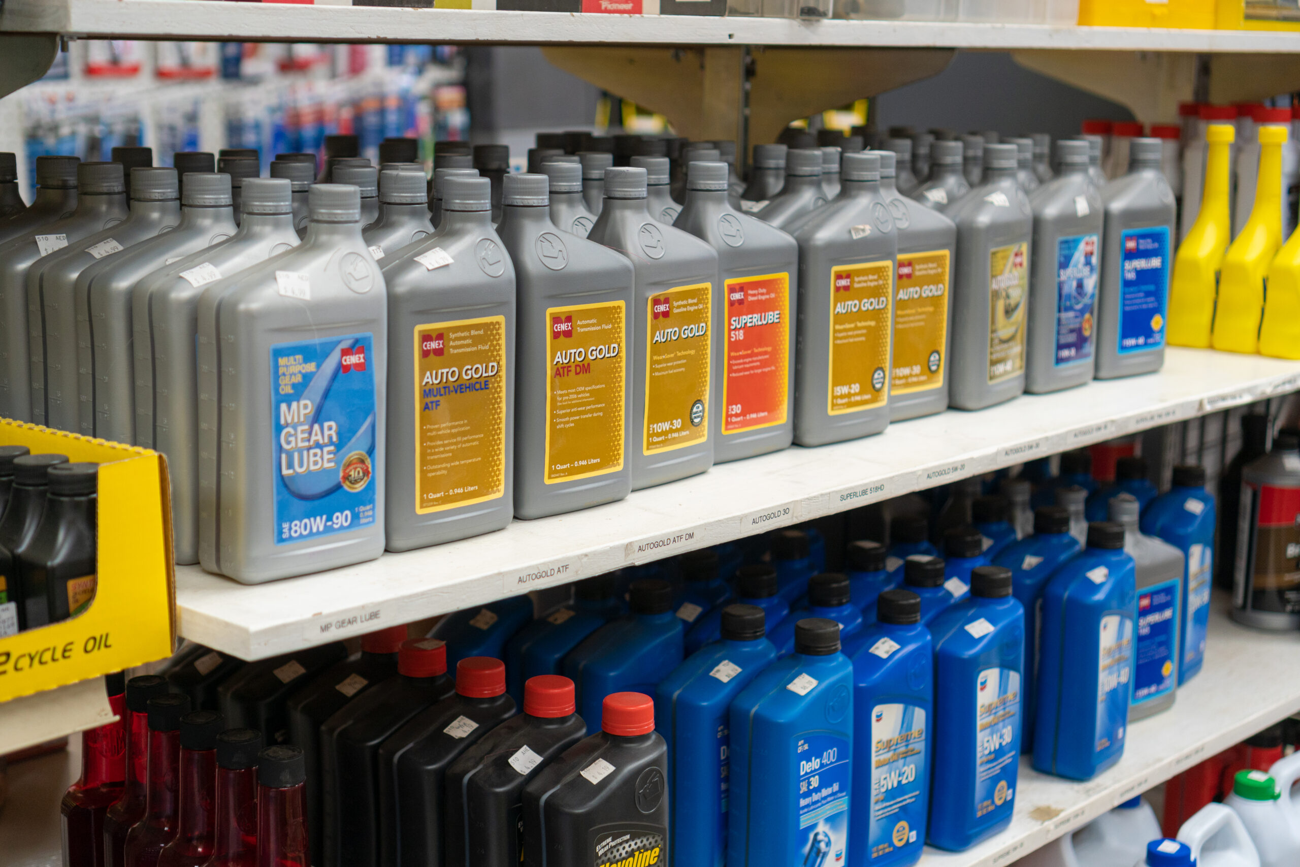 A close up of Cenex & Chevron brand products like Auto Gold & 5W-20 sold by Four Star Supply
