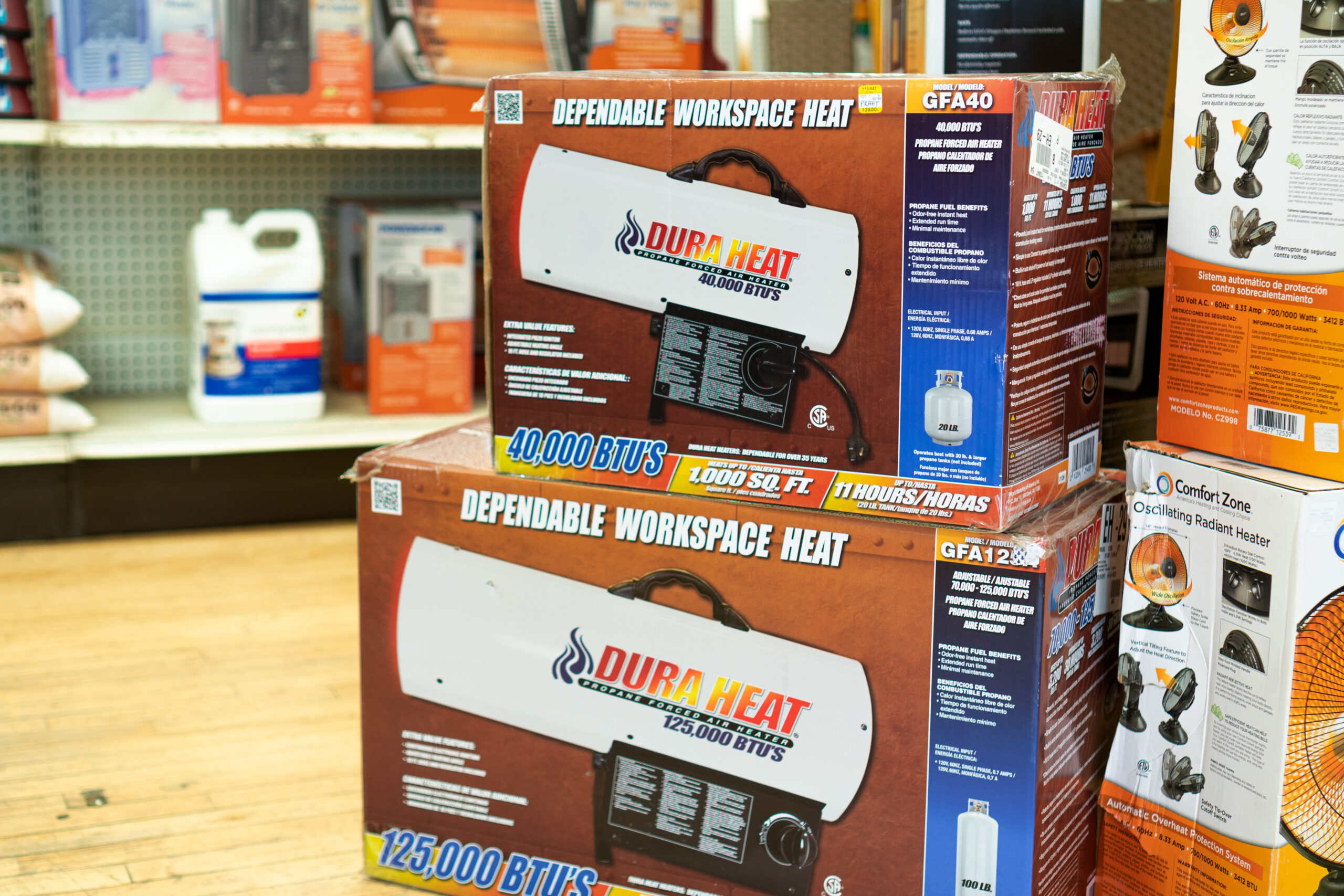 Several boxes containing Dura Heat brand propane forced air heaters