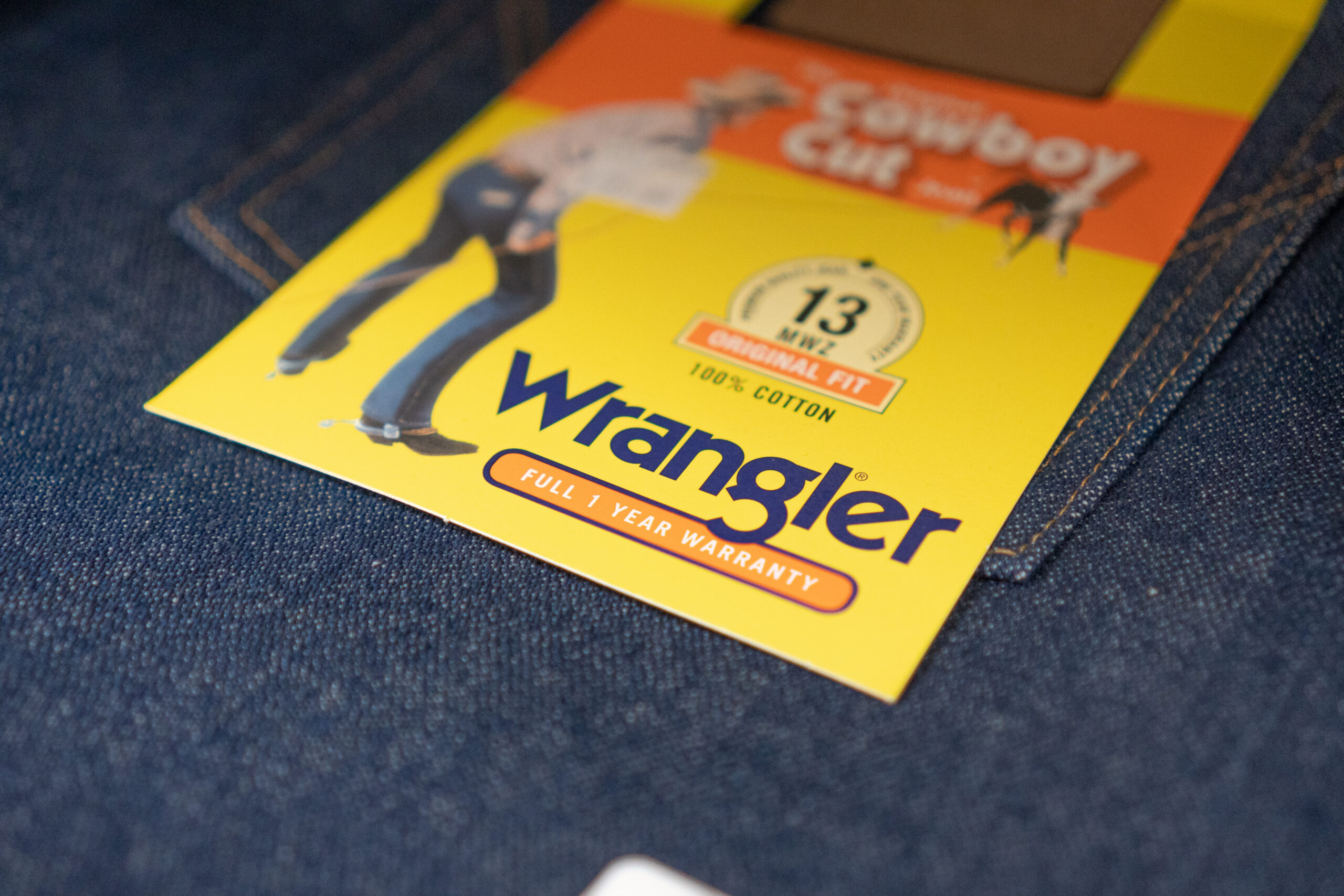 A close up of the tag on a pair of Wrangler Jeans