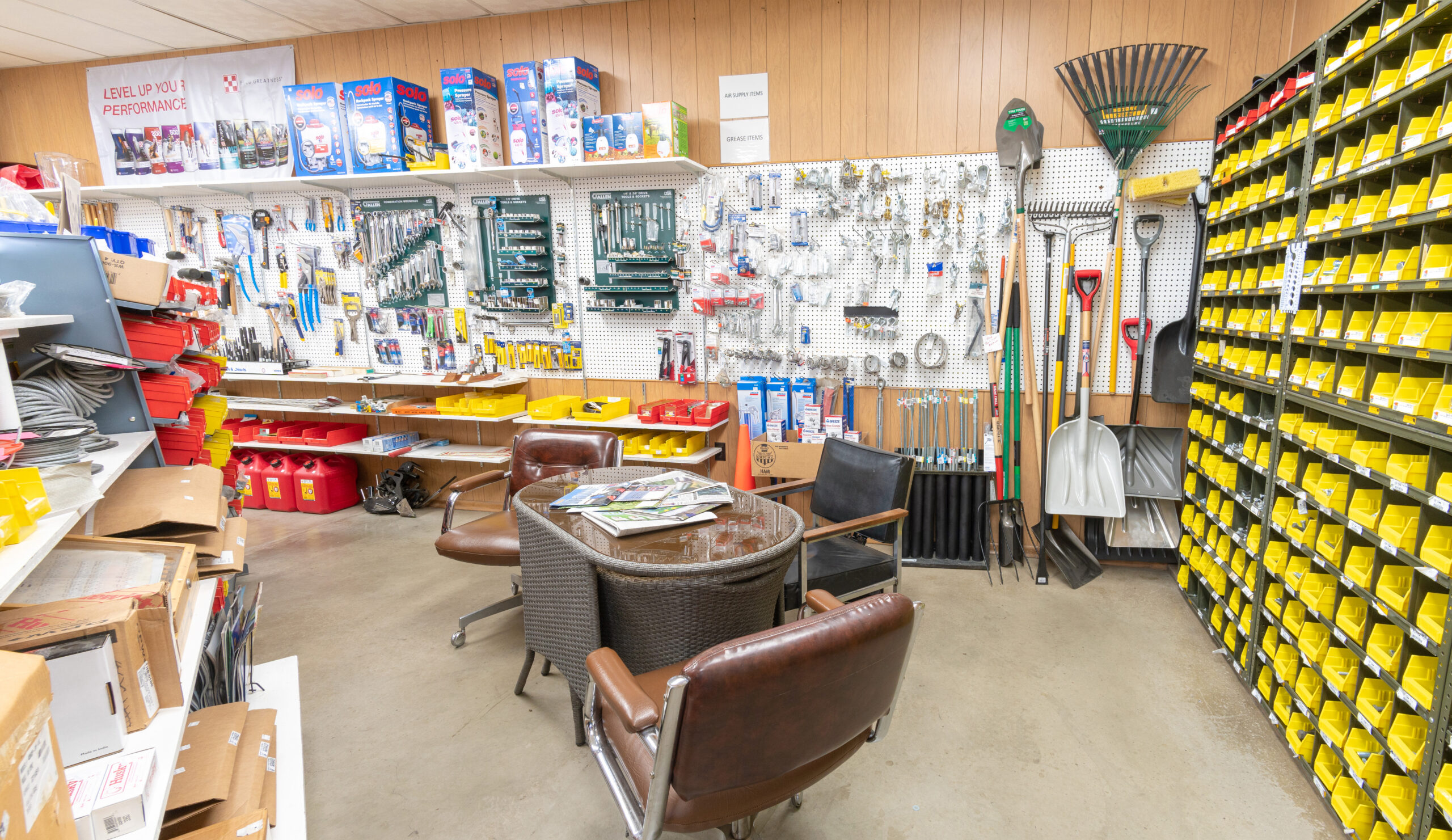 The Tool Aisle and adjacent seating area at Four Star Supply