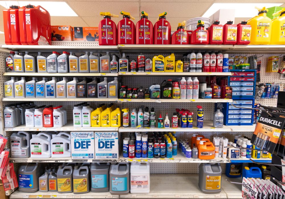 A shelf at Four Star containing brands like Cenex, Mobil, & Pennzoil
