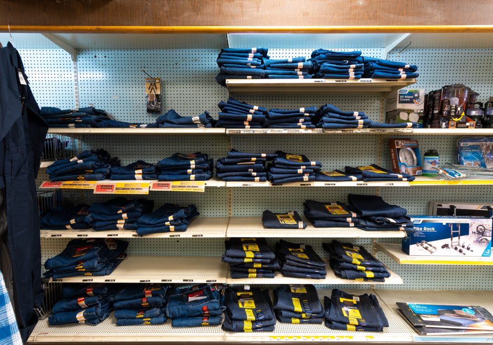 Shelves full of work jeans at Four Star Supply
