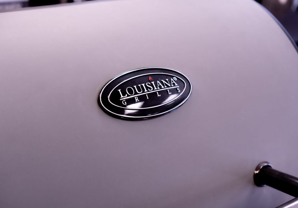 The Louisianna Grills Logo on the hood of a grill