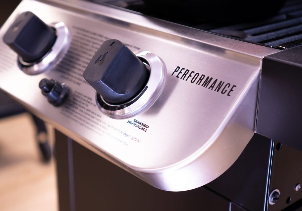 A Char-Broil brand grill's control knobs