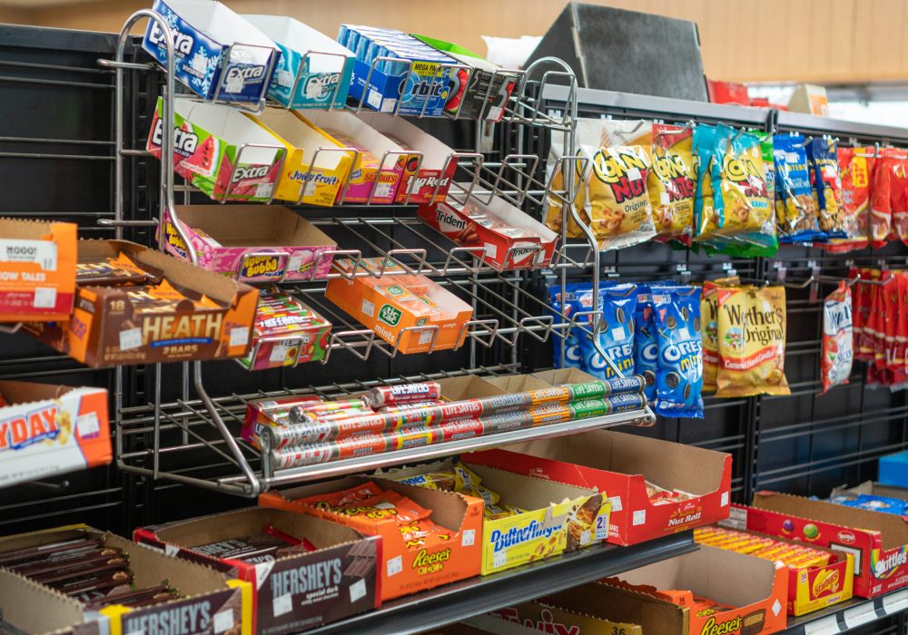 Shelves full of snacks available for sale at a Four Star Supply owned convenience store