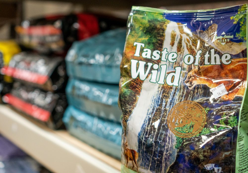 Taste of the Wild pet food next to other bags of pet food