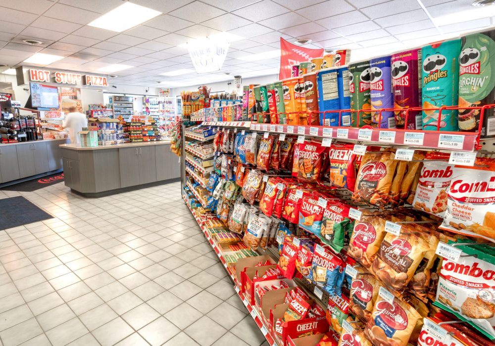 A shelf full of snack foods at Four Star Supply